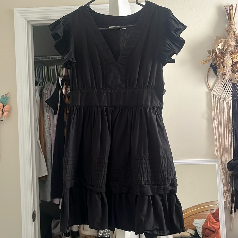 Francesca’s black dress